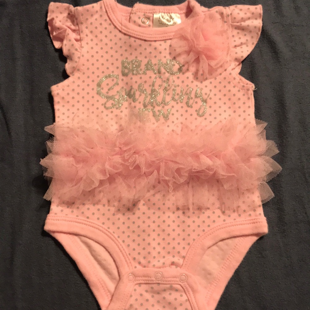 “Brand Sprakling New” pink one piece. Size 0-3 mth